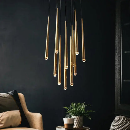 Modern brass crystal led pendant chandelier featuring slender tapered rods and warm bulbs for villa stairs decorbites crystal led