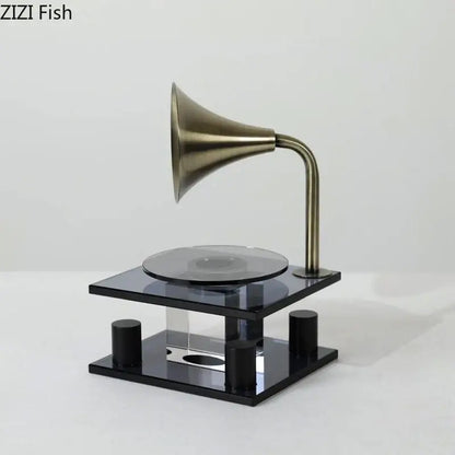 Bronze gramophone-style 3d scanner with black acrylic base and cylindrical supports for modern decorbites crystal music equipment