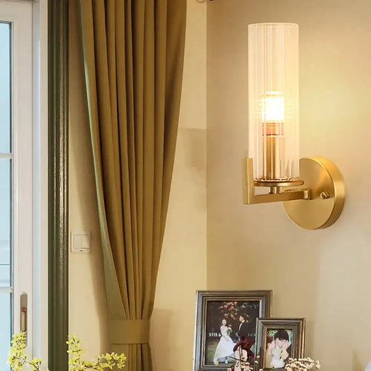 Modern brass crystal wall sconce with gold-toned fixture height and cylindrical frosted glass shade 220v-240v light type