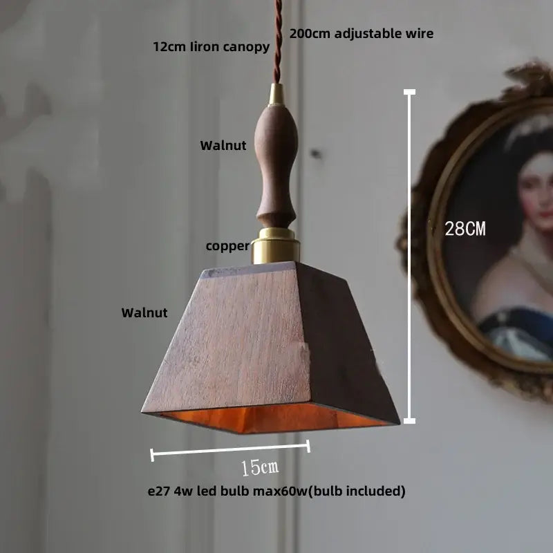 Modern brass and dark wood led wood pendant light with walnut finish copper accent and adjustable wire suspension