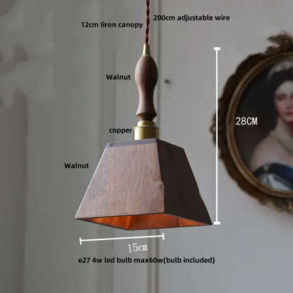 Modern brass and dark wood led wood pendant light with walnut finish copper accent and adjustable wire suspension
