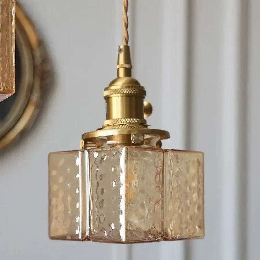 Vintage-style modern brass decorbites cube amber glass pendant lamp with textured amber-tinted glass shade for dining room
