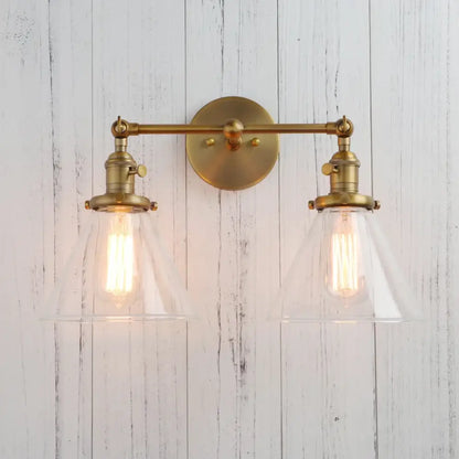 Modern brass decorbites funnel glass wall sconce with brass finish double light fixture and clear conical shades
