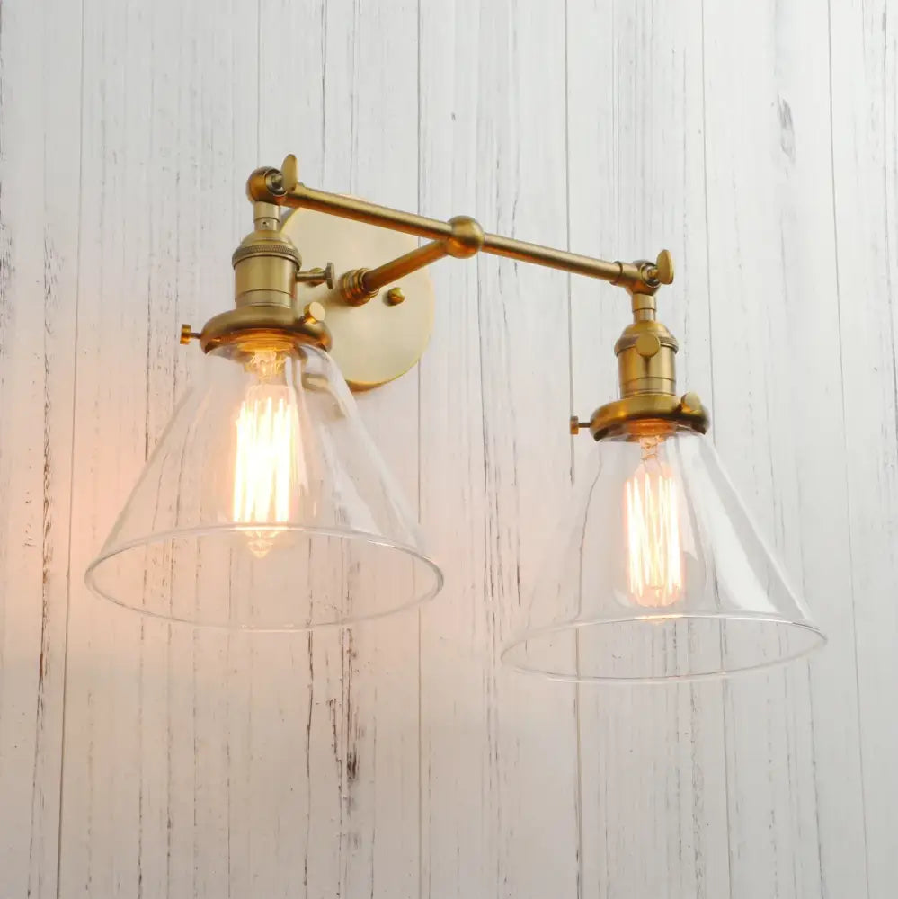 Modern brass decorbites funnel glass wall sconce with double-arm brass frame and clear conical shades light fixture