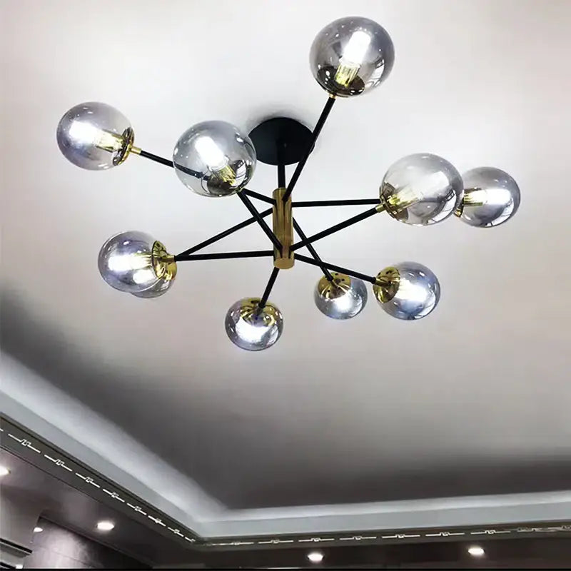 Modern brass decorbites glass ball led chandelier with nine silver glass spheres on black arms for kitchen lighting