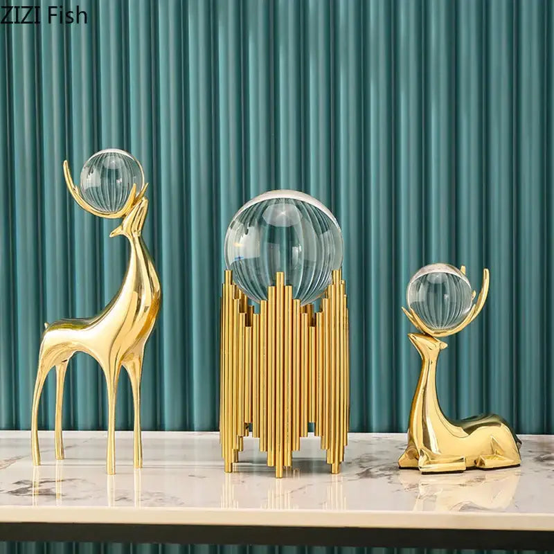 Modern brass deer statue desk ornament featuring golden brass deer with crystal glass orbs on antlers for living room decor