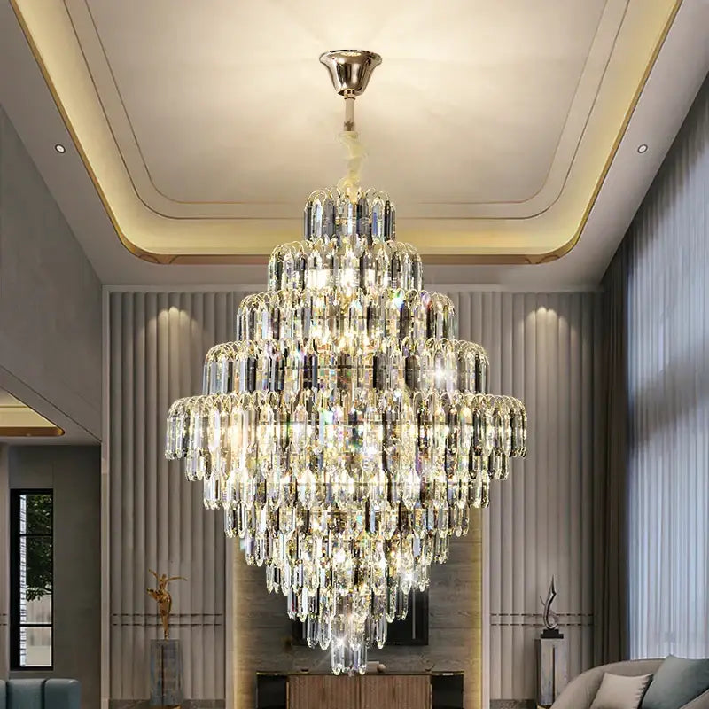 Modern brass designer led crystal chandelier with cascading clear and iridescent crystals for dining room decorbites designer led