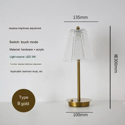 Modern brass diamond touch desk lamp with a gold finish, clear diamond-patterned acrylic shade, and sleek metallic base