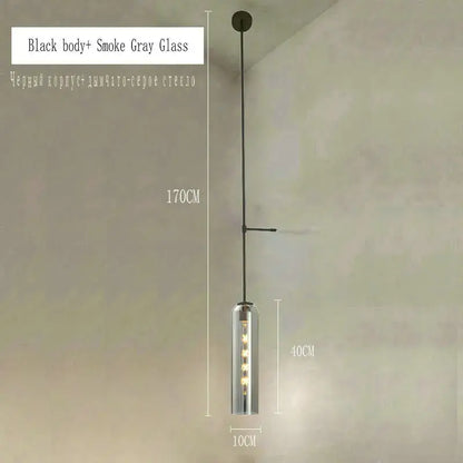 Modern brass e27 glass wall light with black pendant and smoke gray glass cylinder showcasing visible led bulbs