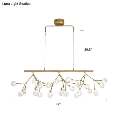 Gold-toned 27-bulb island light with brass finish and clear glass globes for 220v-240v 110v-120v minimalist decor