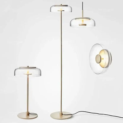 Modern brass floor lamp with clear glass lampshade featuring decorbites circular glass design for living room decor