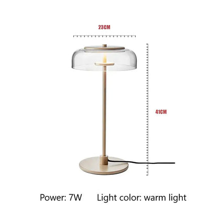 Modern brass floor lamp with beige metal base and clear glass lampshade by decorbites circular glass for living room decor