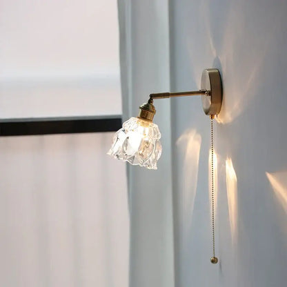 Modern brass flower glass base led wall sconce with faceted crystal shade and pull chain for bedroom decorbites glass base