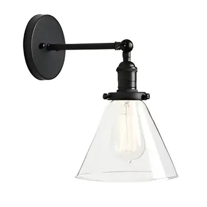 Black wrought iron wall lamp with clear conical glass shade and exposed filament bulb for decorbites funnel glass wall lighting