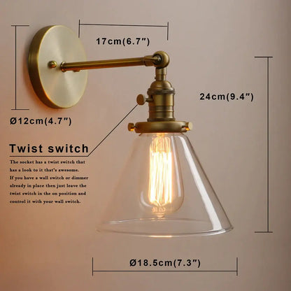 Modern brass funnel glass wall lamp with clear bell-shaped shade and exposed Edison bulb for bedroom lighting decorbites funnel glass wall