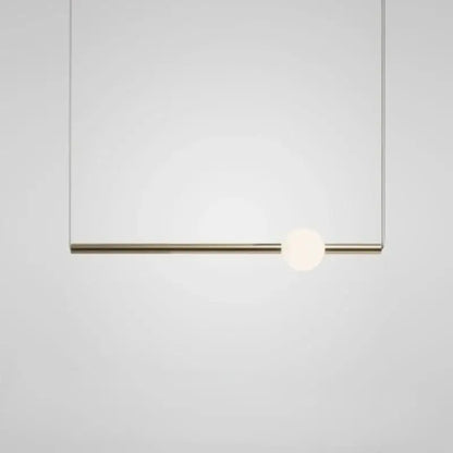 Modern brass geometric glass pendant light with a sleek rod and frosted globe ideal for dining room pendant lights