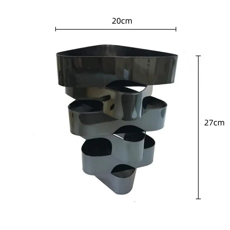 Black glossy metal tiered plant stand with modern sculptural design for decorbites geometric vase living room decor