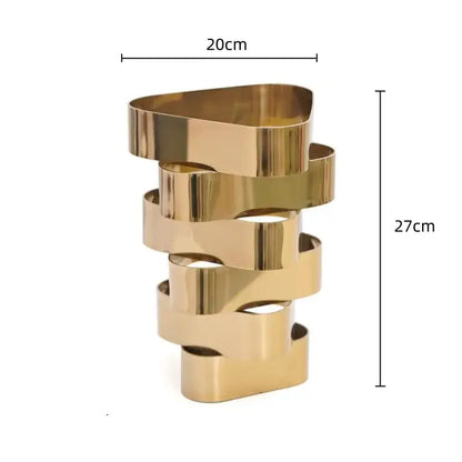 A modern gold-toned metal decorbites geometric vase with interlocking ribbon-like bands for living room decor