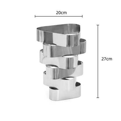 A sleek modern stainless steel decorbites geometric vase with a layered design for metallic living room decor