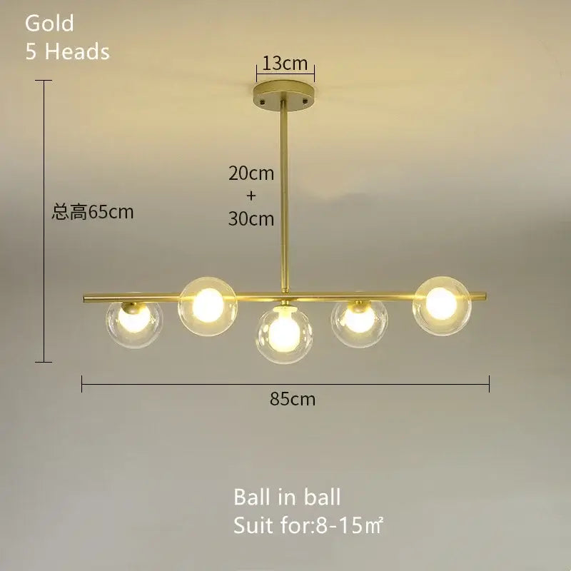 Modern brass glass ball pendant chandelier in gold with five spherical glass bulbs for dining room decorbites glass ball