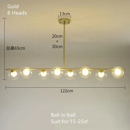 Modern brass glass ball pendant chandelier with gold-colored metal and eight clear glass globe bulbs for dining room decorbites glass ball pendant