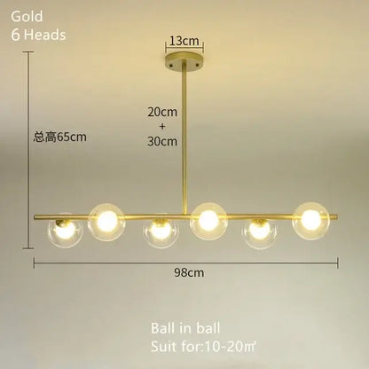 Modern brass glass ball pendant chandelier with six gold-finished spherical glass globe lights for dining room decorbites glass ball
