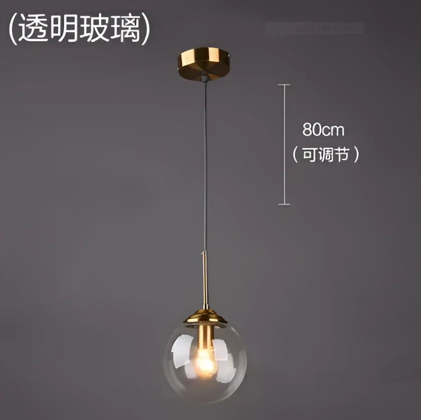 Modern brass glass ball wall lamps with gold-toned pendant light, clear glass globe, and adjustable 80cm chain for decorbites glass ball