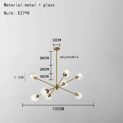 Modern brass glass chandelier with clear glass shades and eight spherical bulbs for elegant living spaces and dining rooms