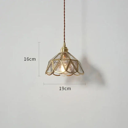 Vintage-style brass and clear glass copper led pendant light with geometric petal design for dining room use
