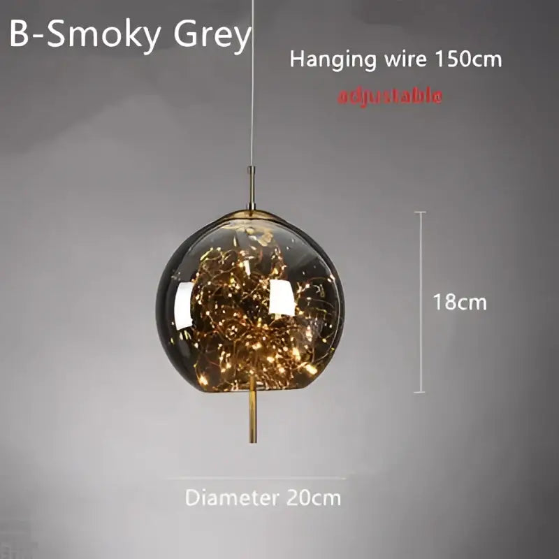 Modern brass glass cord pendant light with b-smoky grey glass globe housing warm led filament bulbs and brass accents