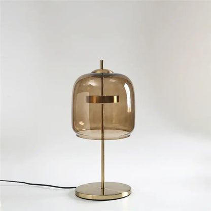 Modern brass glass lampshade led table lamp with translucent amber dome for bedroom decor by decorbites