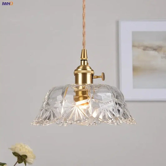 Modern brass glass led pendant light with clear cut glass and brass fixture featuring an edison-style bulb for dining room decorbites brass glass