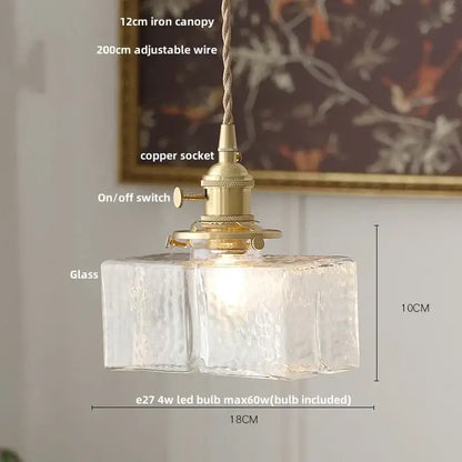 Modern brass glass led pendant light with clear textured glass, brass copper socket, and 12cm iron canopy for dining room decorbites brass glass