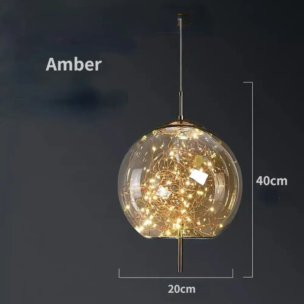 Modern brass glass pendant light with amber spherical glass pendant and intricate golden fairy lights for bedroom use