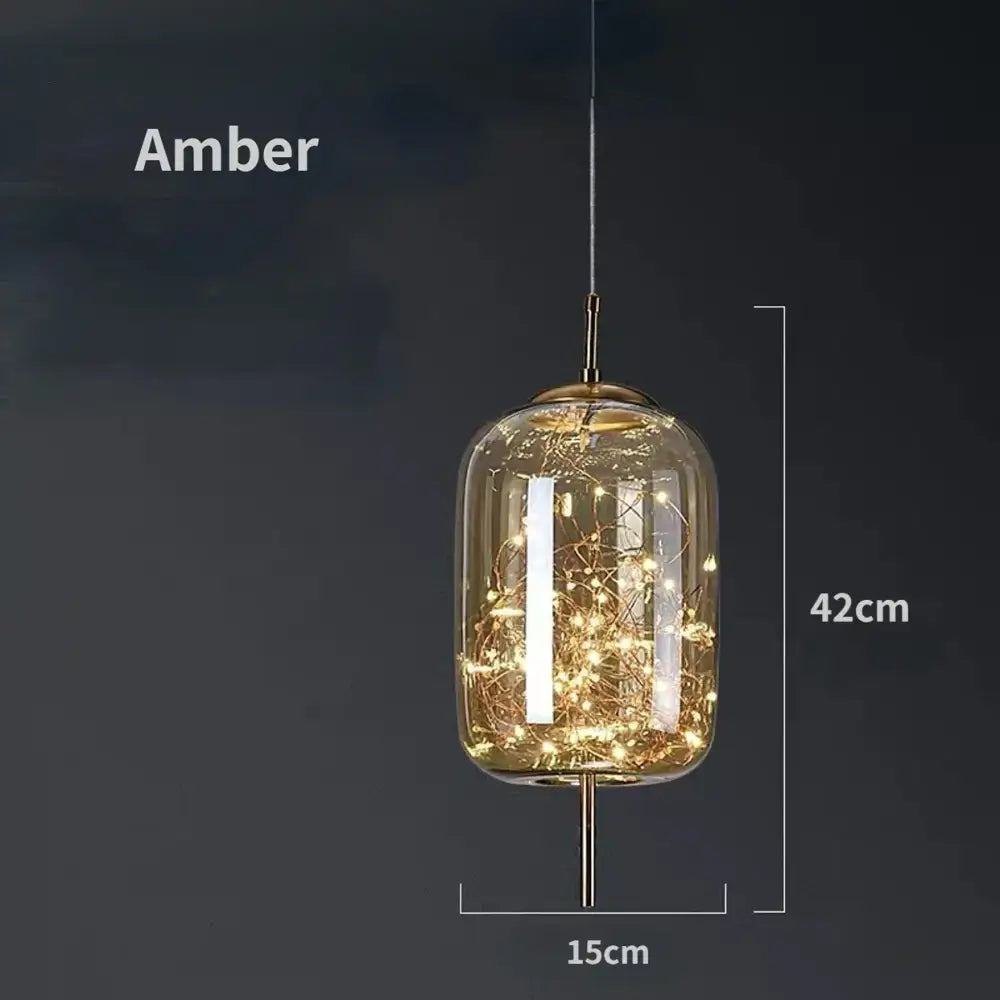 Modern brass glass pendant light with amber-colored glass pendant and warm fairy lights for bedroom chandelier use