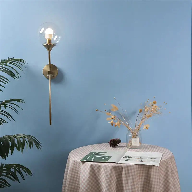 Modern brass golden glass ball wall lamps with clear glass globe for bedroom sconce decorbites golden glass design