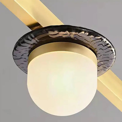 Modern brass gray glass led chandeliers featuring a frosted gray glass globe and textured black metal ring pendant light