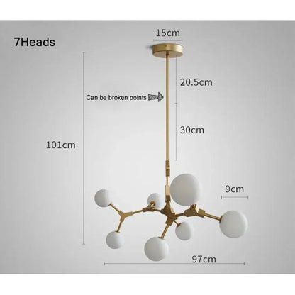 Modern brass iron magic pendant lights with gold-toned metal frame and seven frosted white spherical shades for dining room decor