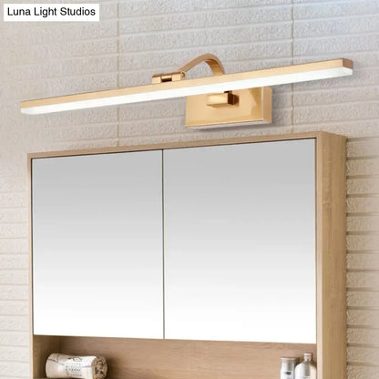 Modern brass linear vanity led light with gold finish, sleek rectangular design, and integrated mounting bracket for bathroom use