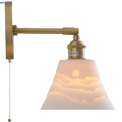 Modern brass mountain led wall lamp sconce with frosted glass shade featuring etched mountain and sun design