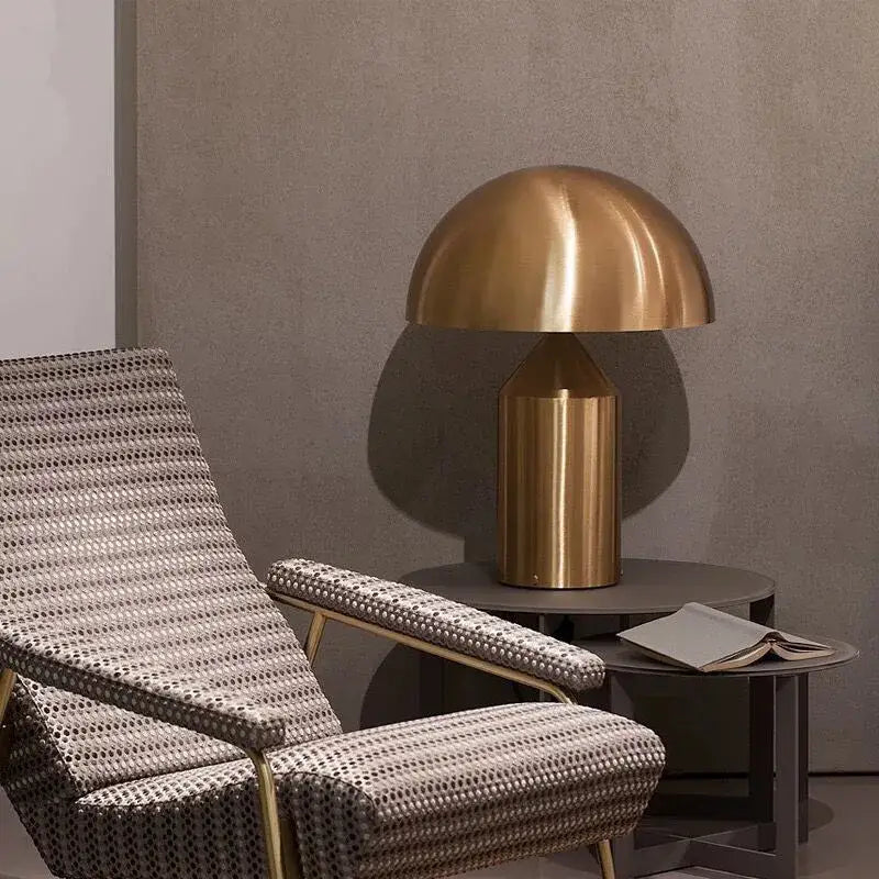 Modern brass mushroom metal led table lamp with sleek reflective finish for bedroom night light decorbites atollo metal
