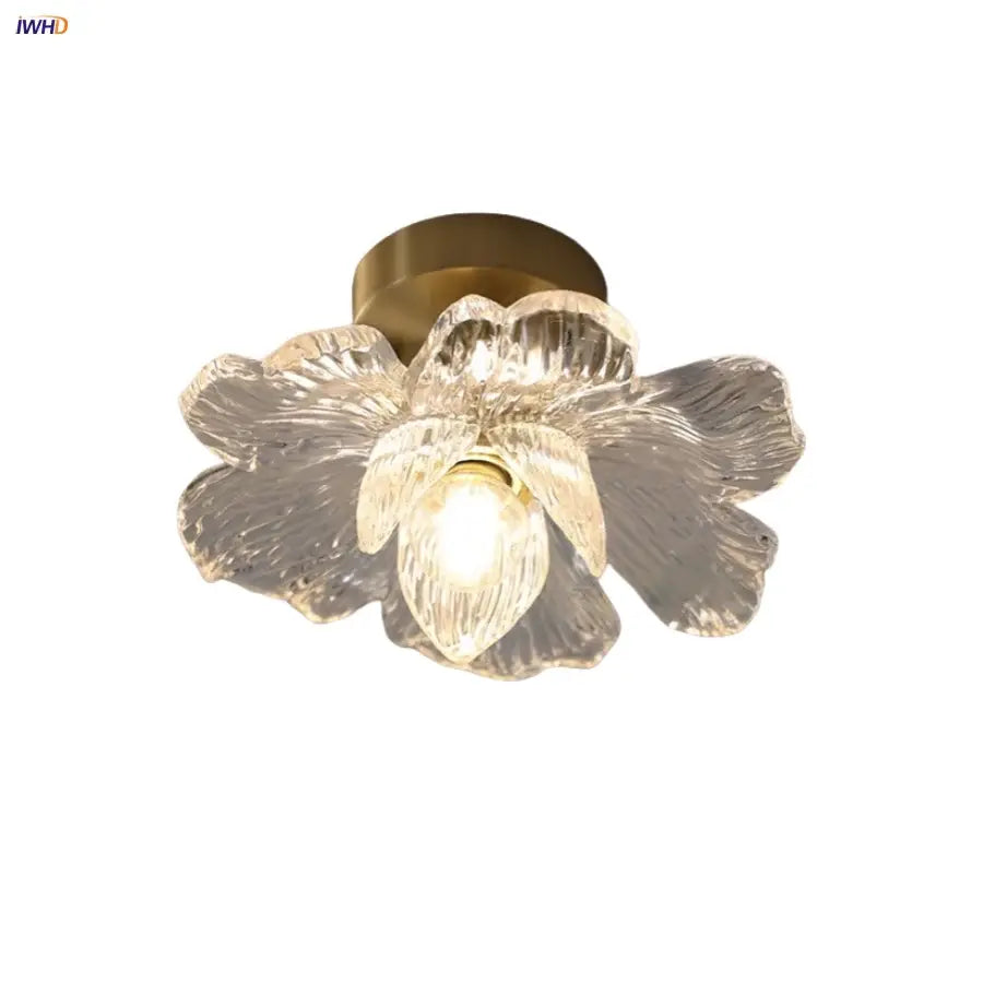 Modern brass orchid glass led ceiling lamp featuring a delicate translucent glass orchid with warm brass base for bedroom