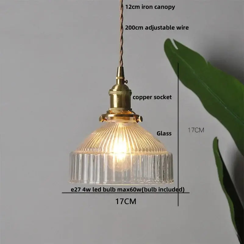 Modern brass ribbed clear glass pendant lamp with a brass copper socket and adjustable iron canopy, perfect for dining room decorbites clear glass