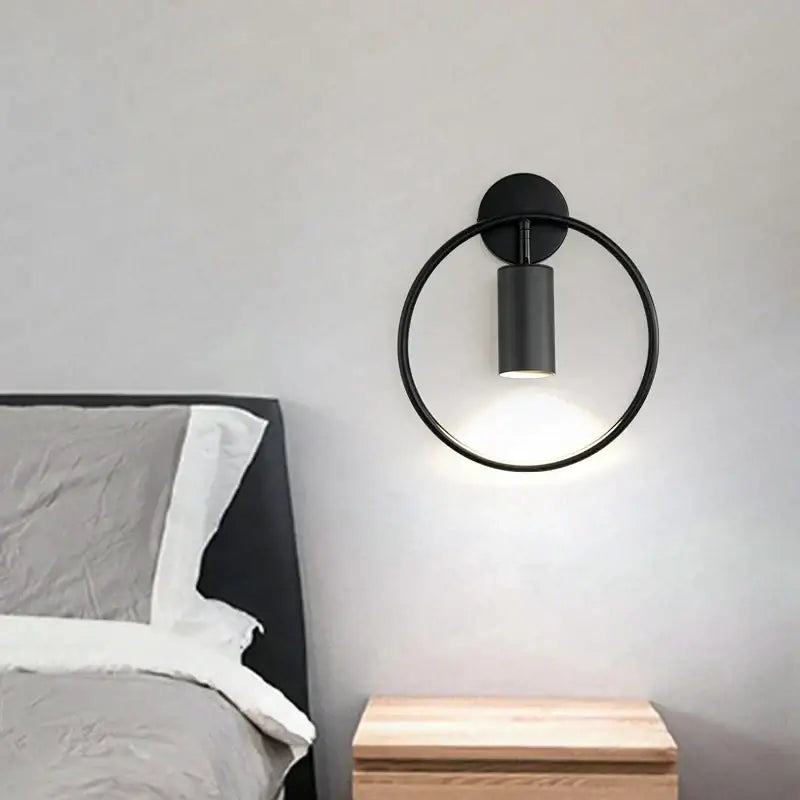 Black minimalist wall sconce with brass ring led circular light and cylindrical fixture for modern decorbites brass ring lighting