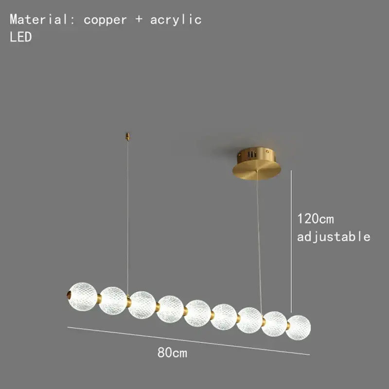 Modern brass round led pendant lights featuring frosted glass spheres with copper accents for dining room decorbites brass round