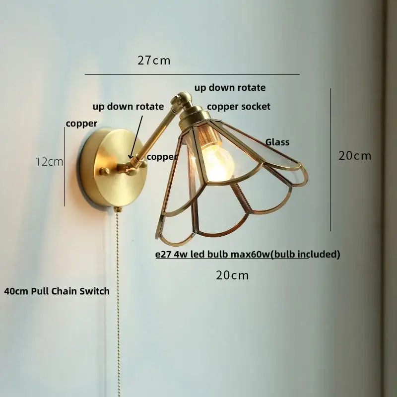 Modern brass wall lamp with copper adjustable arm and decorbites clear glass shade for bedroom reading light decor