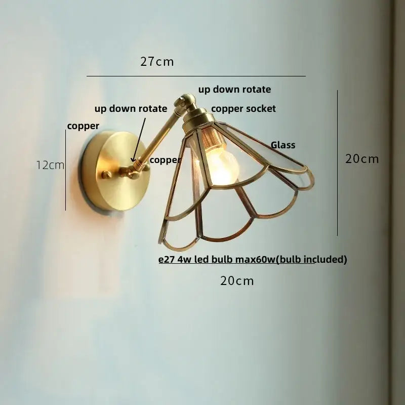 Modern brass wall lamp with clear glass shade copper finish and adjustable arm for bedroom reading decorbites clear glass