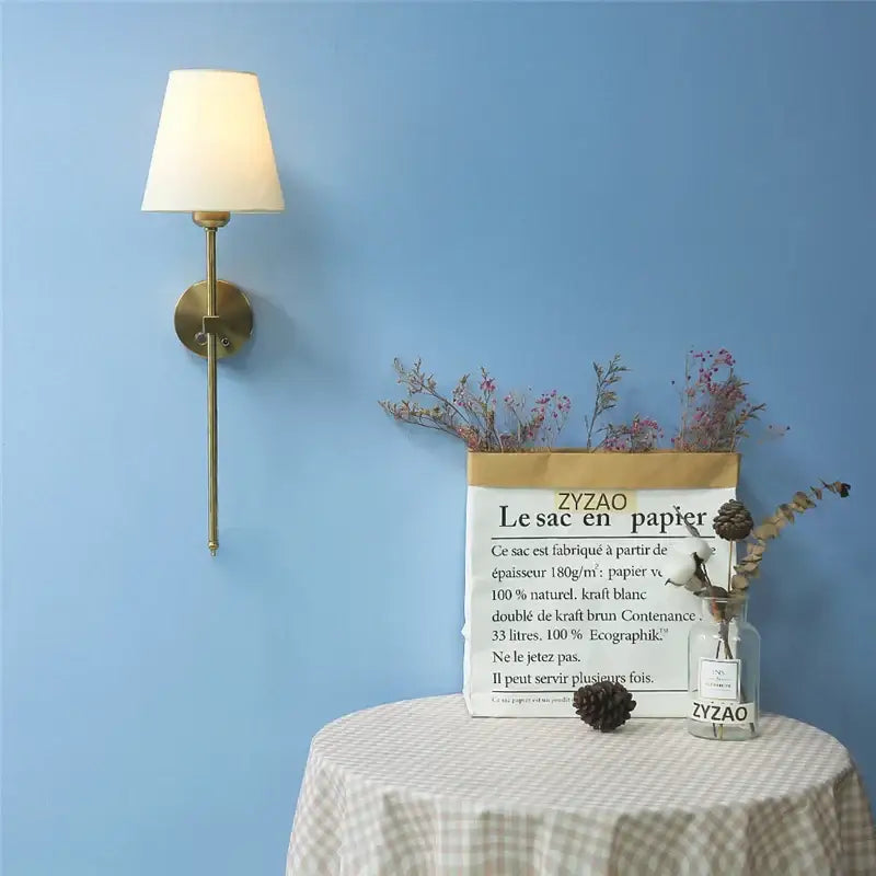 Modern brass wall sconce with cream fabric shade featuring decorbites gold touch led for dining room lighting decor