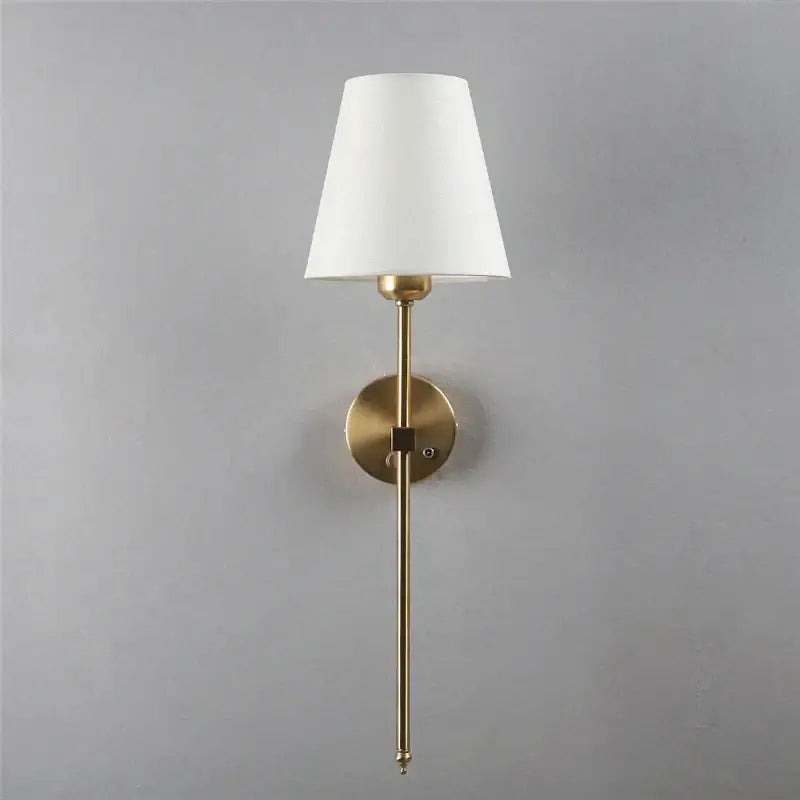 A sleek modern brass wall sconce with white tapered shade decorbites gold touch led for dining room decor