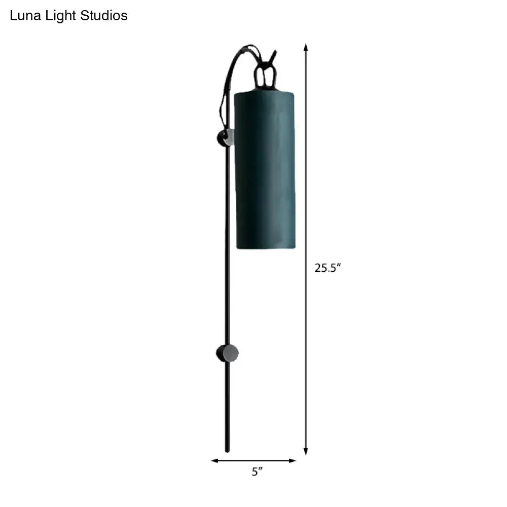 Modern dark teal cylindrical wall sconce with black metal frame and bunny top, direct wired electric 220v-240v suitable for living room